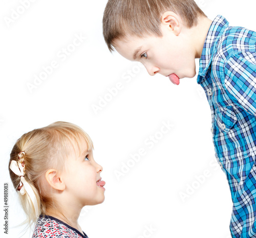 Photo: Children sticking out tongues Children sticking out tongues