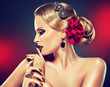 Blonde model  in burgundy makeup and stylish hairstyle