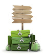 Foto: Baggage by wooden sign Baggage by wooden sign