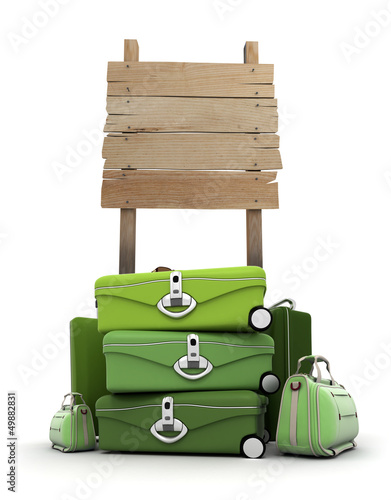 Photo: Baggage by wooden sign Baggage by wooden sign