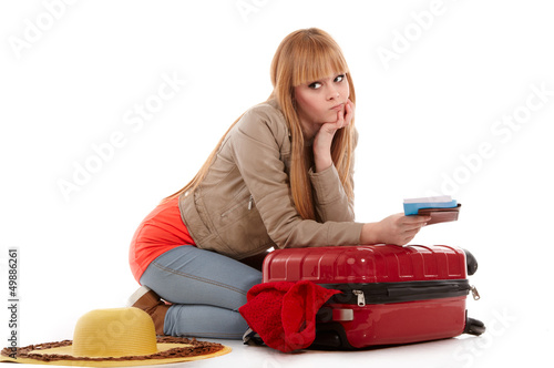 Photo: young girl with suitcase on white young girl with suitcase on white