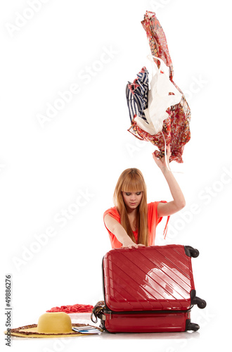 Photo: young girl with suitcase on white young girl with suitcase on white