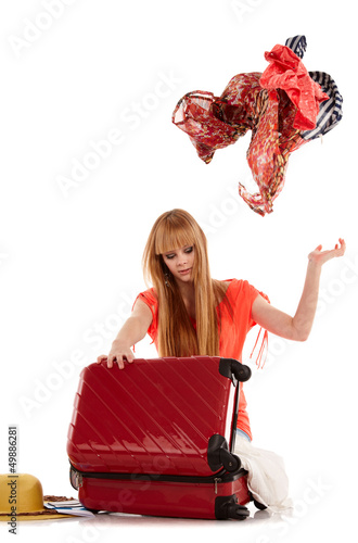 Photo: young girl with suitcase on white young girl with suitcase on white