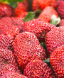 Group of ripe strawberries arranged