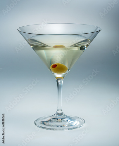 Photo: Martini with olive isolated. vermouth Martini with olive isolated. vermouth