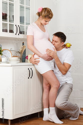 Photo: Happy pregnant family Happy pregnant family