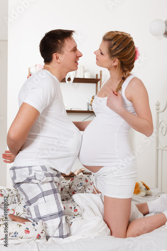 Photo: Happy pregnant family. Happy pregnant family.