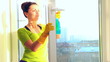 Women cleaning a window