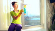 Women cleaning a window