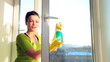 Women cleaning a window