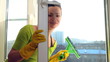 Women cleaning a window