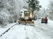 snowplow open road in winter time