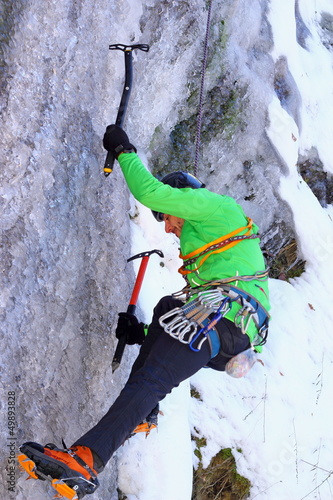 Photo: climbing an ice wall climbing an ice wall