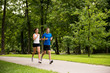 Photo: Jogging together - young couple running Jogging together - young couple running