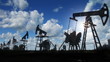 Video: working oil pumps silhouette against timelapse clouds working oil pumps silhouette against timelapse clouds