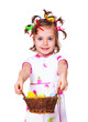 Girl holding basket with Easter decoration