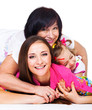 Young woman, her mother and daughter