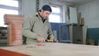 Furniture maker at work in workshop
