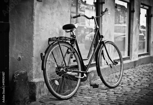 Photo: Classic vintage retro city bicycle in Copenhagen, Denmark Classic vintage retro city bicycle in Copenhagen, Denmark