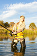 Foto: woman fishing in pond woman fishing in pond