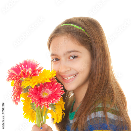 Photo: child with bunch of flowers child with bunch of flowers