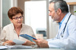 Doctor talking to his female patient at office