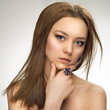 Closeup fashion portrait of young beautiful woman