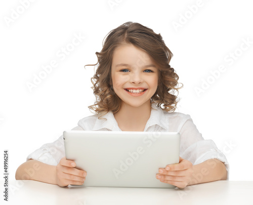Photo: girl with tablet pc girl with tablet pc