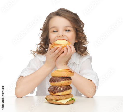 Photo: girl with junk food girl with junk food