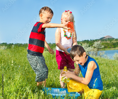 Photo: Kids splashing water Kids splashing water