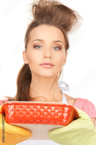 Photo: beautiful cooking housewife beautiful cooking housewife