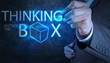 businessman hand draw thinking outside the box