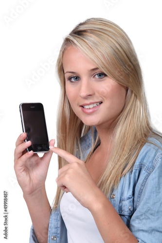 Photo: girl holding phone girl holding phone