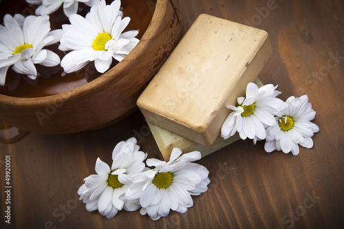 Photo: Spa soap with bowl of water and flowers Spa soap with bowl of water and flowers