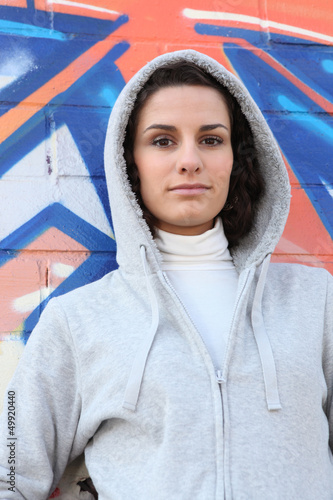 Photo: Woman in a hooded sweatshirt Woman in a hooded sweatshirt