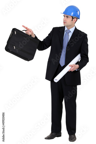 Photo: Engineer holding a briefcase Engineer holding a briefcase