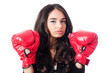 Young woman with boxing glove