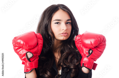 Photo: Young woman with boxing glove Young woman with boxing glove