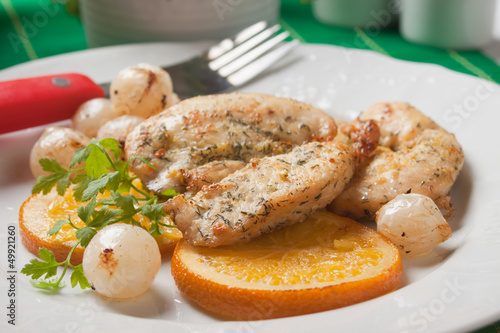 Photo: Chicken steak with fried oranges and onion Chicken steak with fried oranges and onion