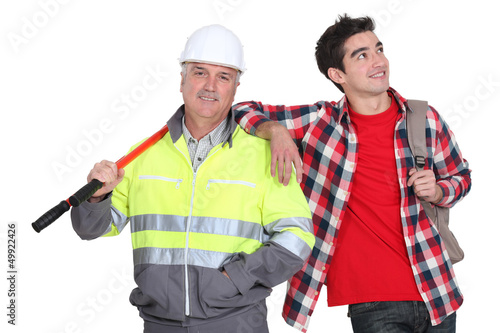 Photo: Builder stood with new employee Builder stood with new employee