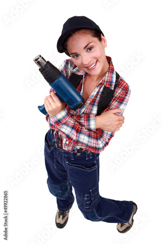 Photo: Painter with a hair dryer Painter with a hair dryer