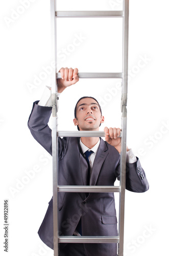 Photo: Businessman climbing the ladder isolated on white Businessman climbing the ladder isolated on white