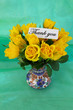 Thank you note and yellow roses
