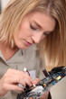 Woman with electronic component