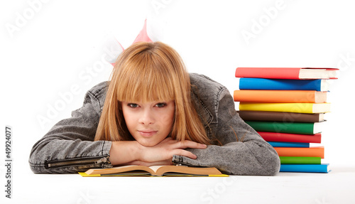 Photo: Young girl with books. Isolated on white background Young girl with books. Isolated on white background