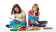 Two Teenage Girls reading The Book.Education