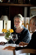 Mature couple dining in an elegant restaurant