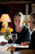 Mature couple dining in an elegant restaurant