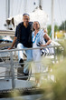 Mature couple enjoying a stroll at a marina