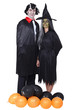 Couple disguised in vampire and witch